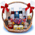 Geschenkkorb mit Honig, Sirup, Konfitüre und edler Schokolade