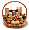 Geschenkkorb mit Honig, Konfitüre, Sirup und Schokoladen-Osterei