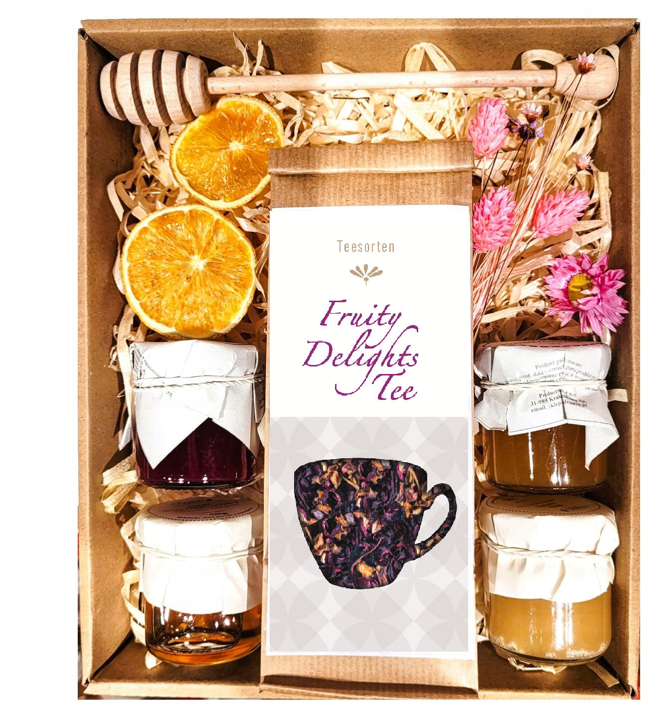 Geschenkkorb mit Tee, Konfitüre und Honig