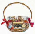 Geschenkkorb mit Honig, Lebkuchen, Sirup und Schokolade