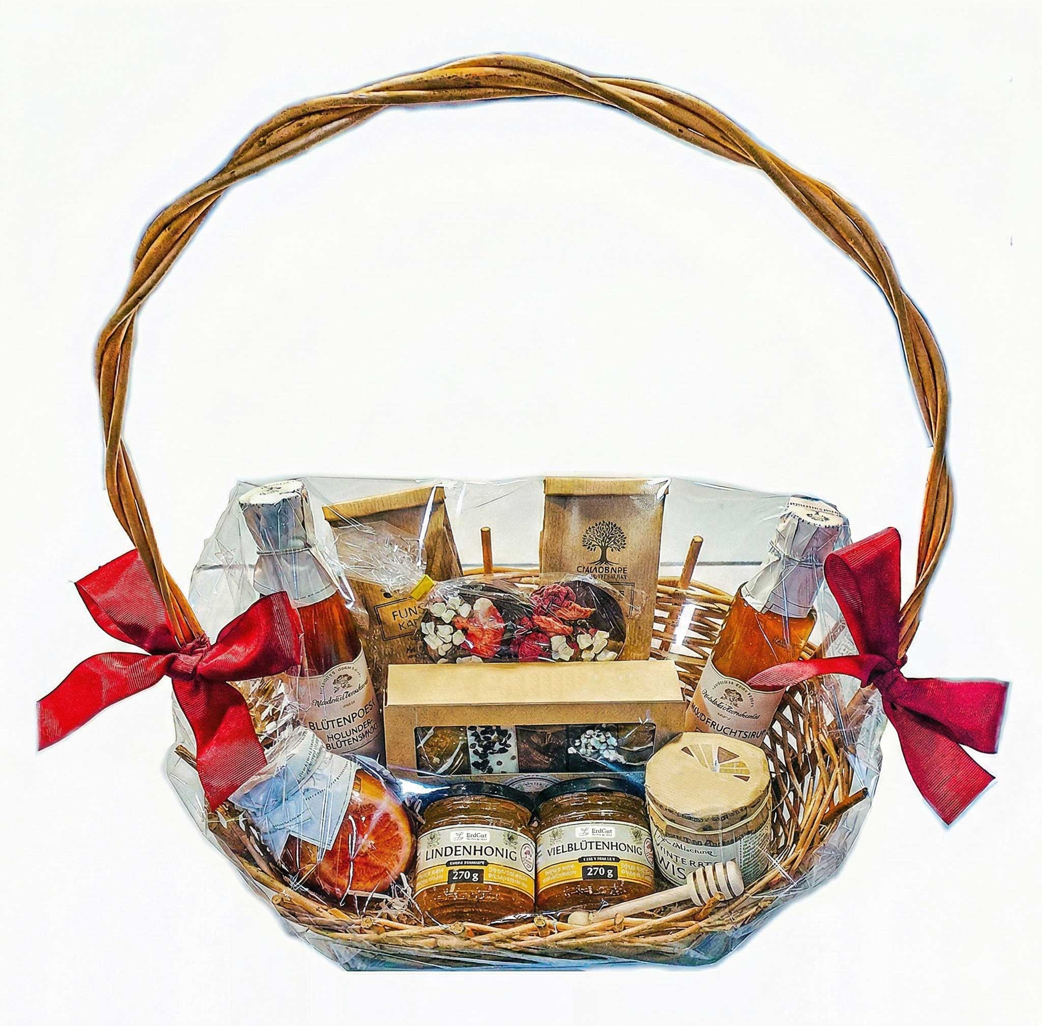 Geschenkkorb mit Honig, Lebkuchen, Sirup und Schokolade