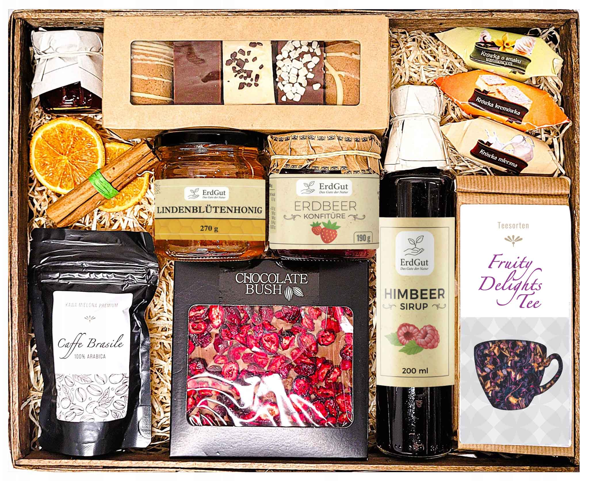 Geschenkkorb mit Kaffee, Tee, Schokolade, Sirup und Honig