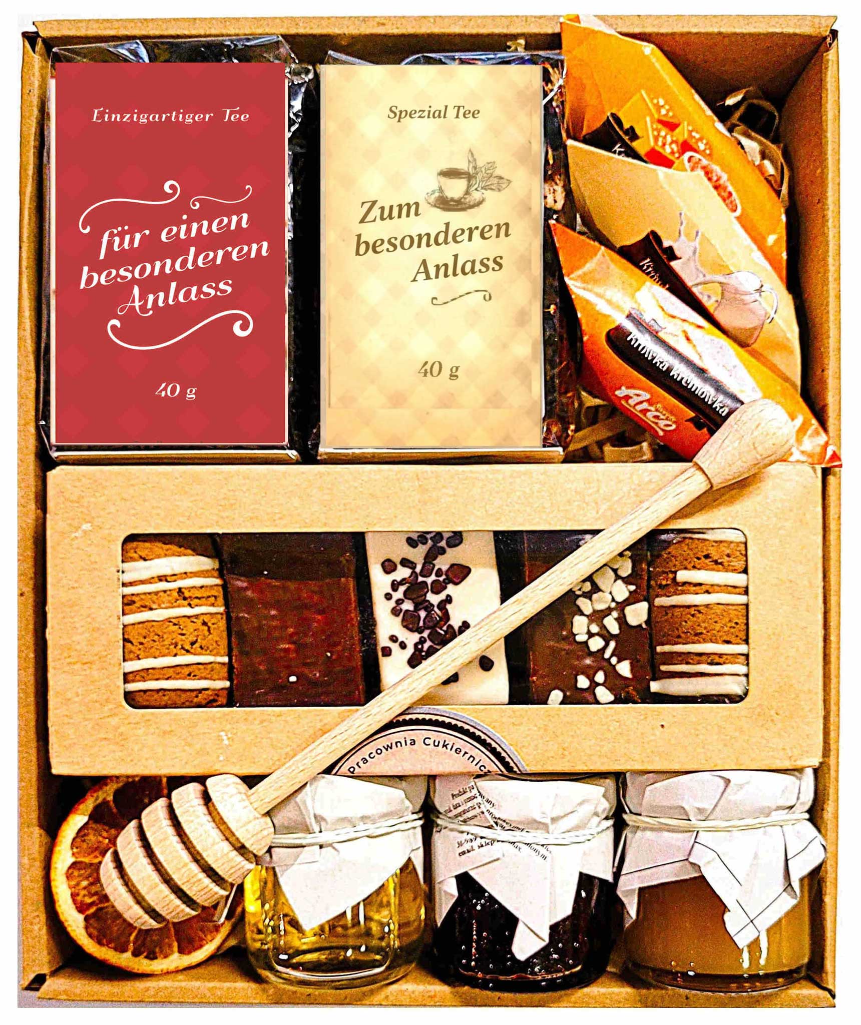 Geschenkkorb mit Tee, Lebkuchen, Toffees und Honig