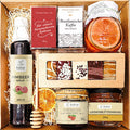Geschenkkorb mit Kaffee, Tee, Sirup, Honig und Lebkuchen