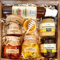 Geschenkkorb mit Honig, Sirup, Konfitüre und Zitronen-Spezialitäten
